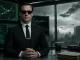 Agent Mann in a cold Matrix command-center environment for a Zion satire article.