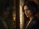 Seraphine in a warm domestic Matrix threshold atmosphere for an Oracle article.